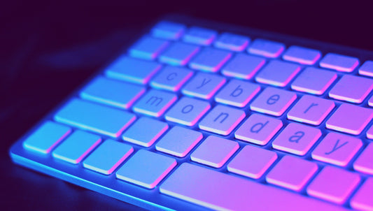 a blank keyboard with keys spelling cyber monday with purple and blue coloring. Image by Artapixel from Pixabay